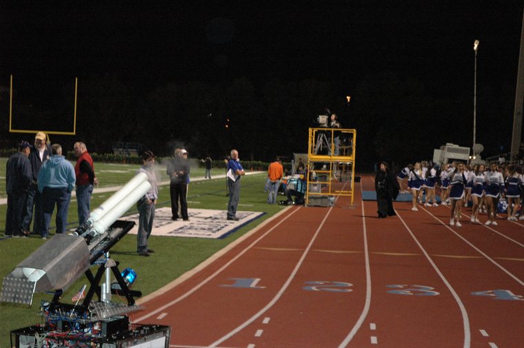 Team 79 Krunch's t-shirt cannon robot firing at a school pep rally